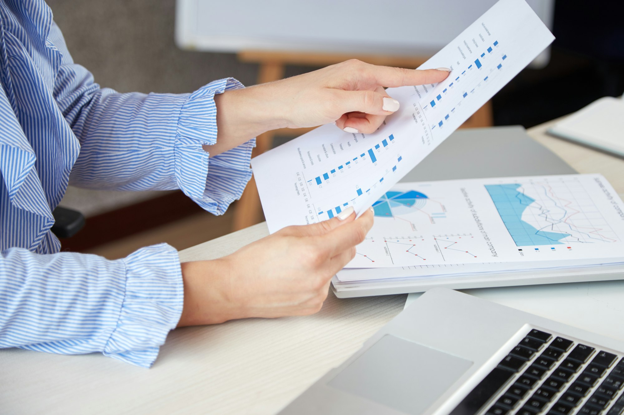 Businesswoman analysing documents